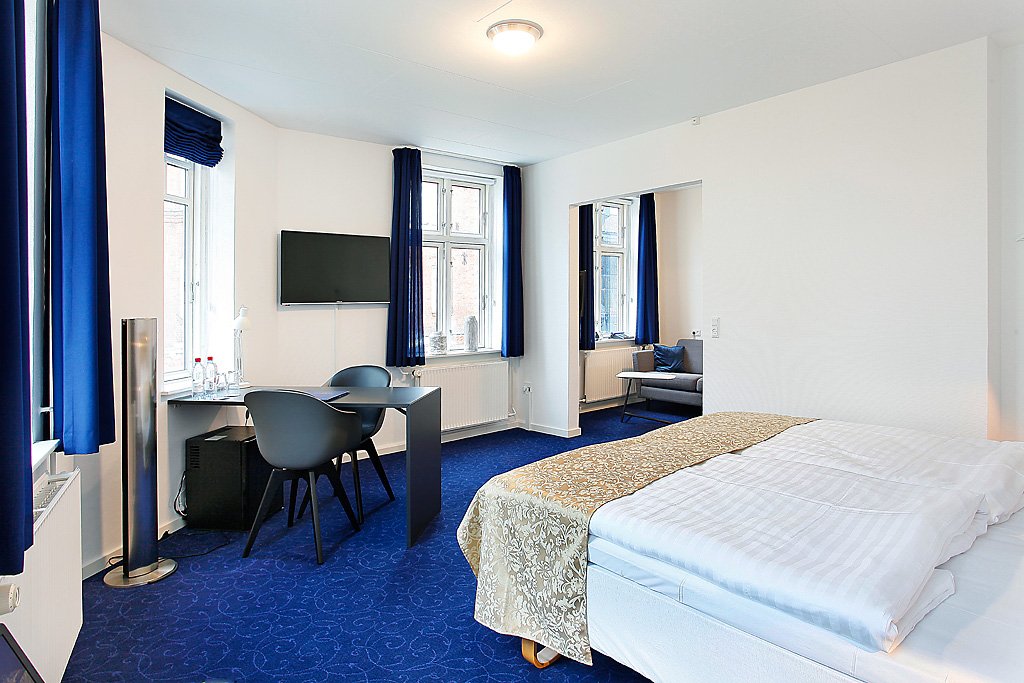 Juniorsuite med skrivebord, minibar og opholdsområde